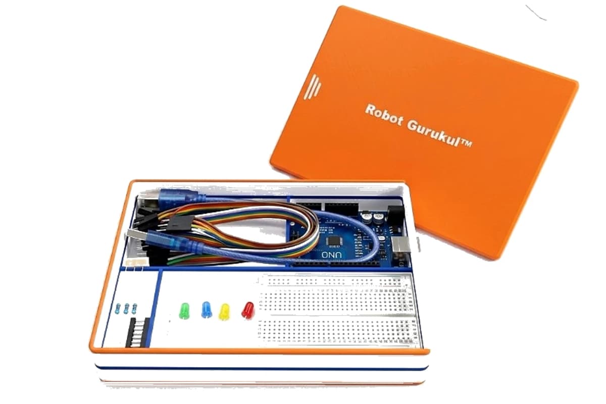 Robot Gurukul kit tray at home with board, lights, wires and USB cable